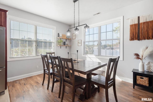 dining area featuring hardwood / wood-style floors