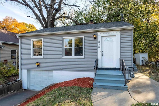 view of front of home with a garage