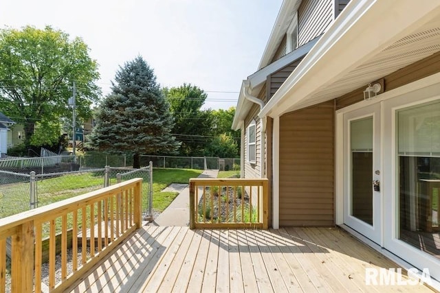 deck featuring a lawn