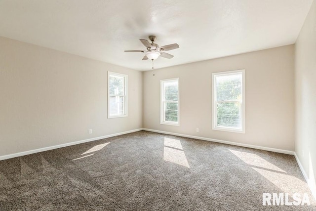 carpeted empty room with ceiling fan