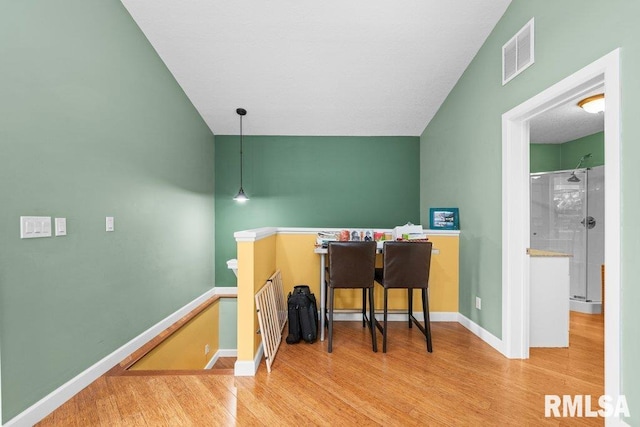 office area with light hardwood / wood-style flooring