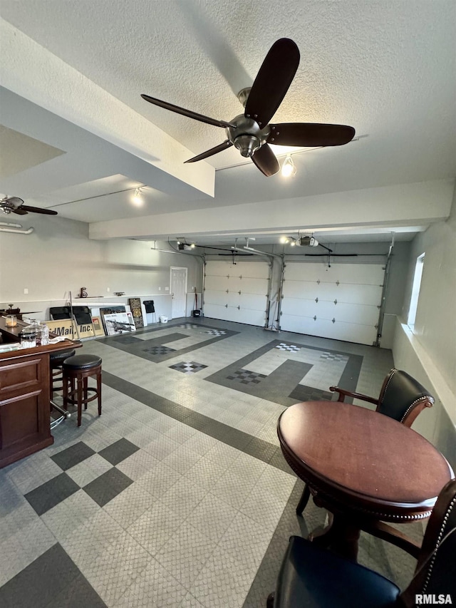 garage featuring ceiling fan