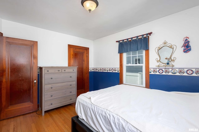 bedroom featuring light hardwood / wood-style floors