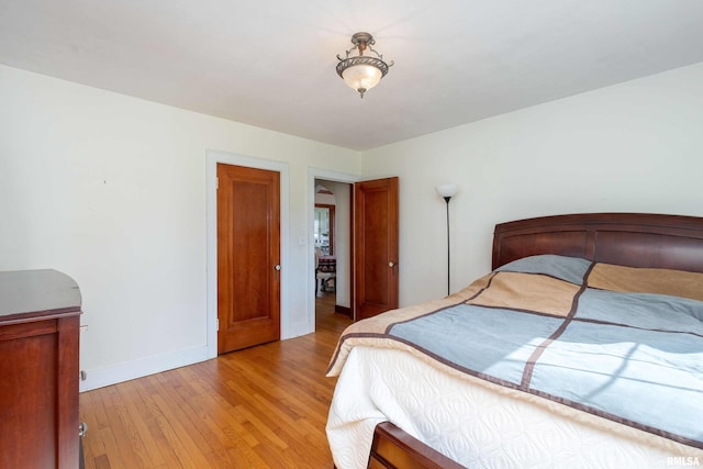 bedroom with light hardwood / wood-style flooring