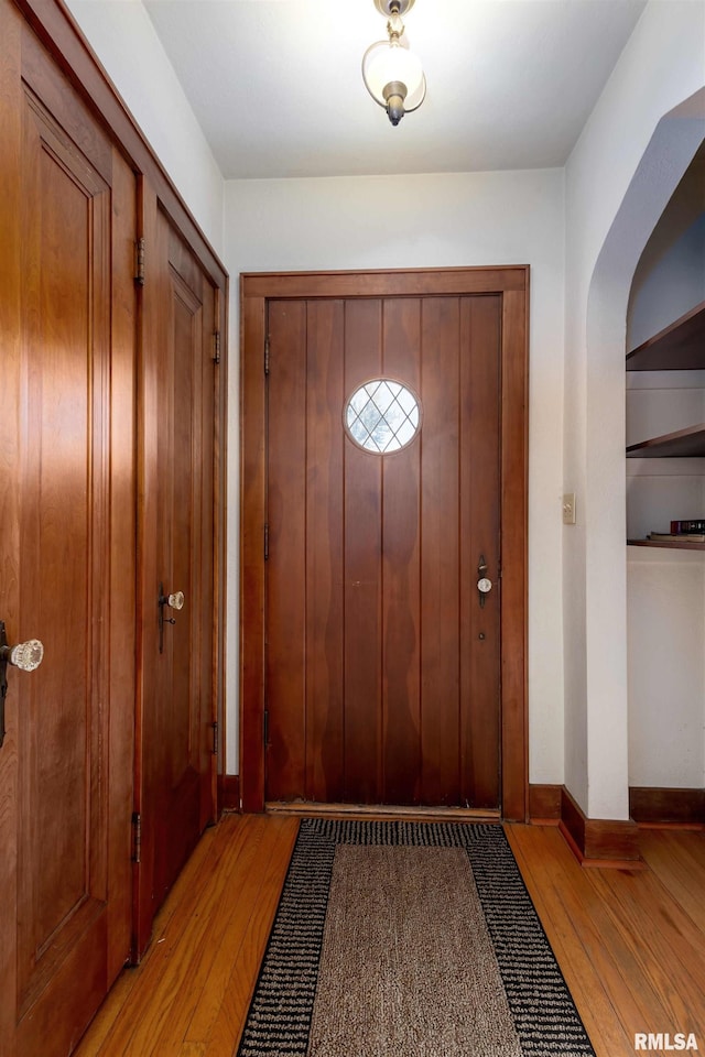 entrance foyer with light wood-type flooring