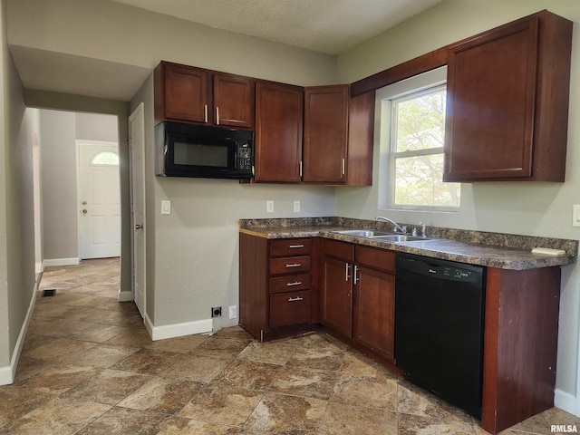 kitchen with black appliances and sink