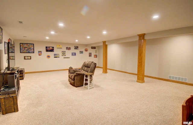 living area with carpet flooring