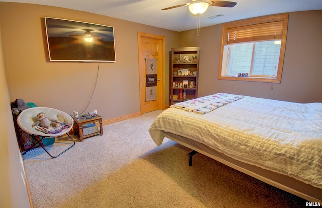 bedroom featuring ceiling fan and carpet flooring