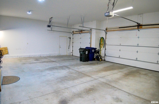 garage featuring a garage door opener