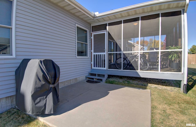 view of patio / terrace with a sunroom