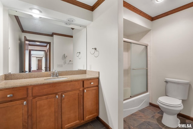 full bathroom with toilet, enclosed tub / shower combo, vanity, and ornamental molding