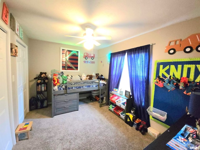 carpeted bedroom featuring ceiling fan