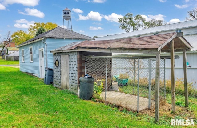 view of outdoor structure with a yard