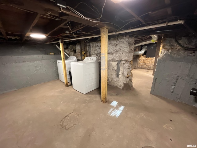 basement with washing machine and clothes dryer