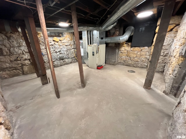 basement featuring heating unit