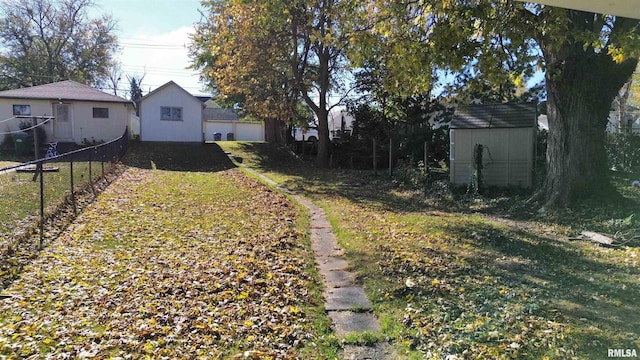 825 11th Ave S, Clinton, IA 52732 - view of yard featuring a shed and a garage