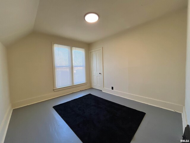 825 11th Ave S, Clinton, IA 52732 - additional living space with lofted ceiling and baseboards