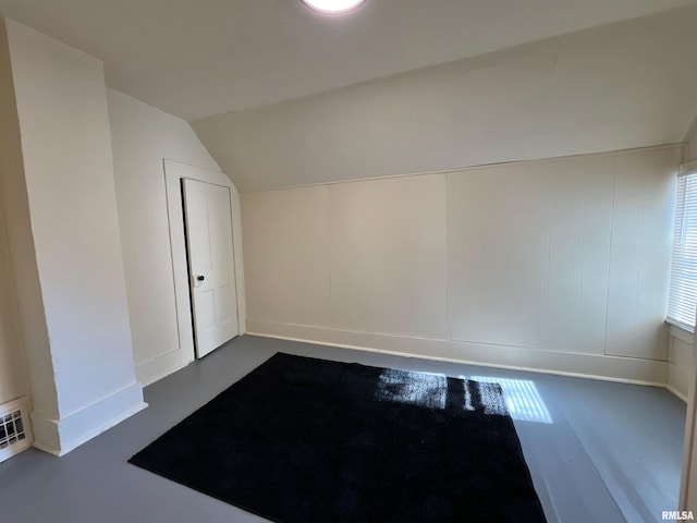 bonus room featuring lofted ceiling