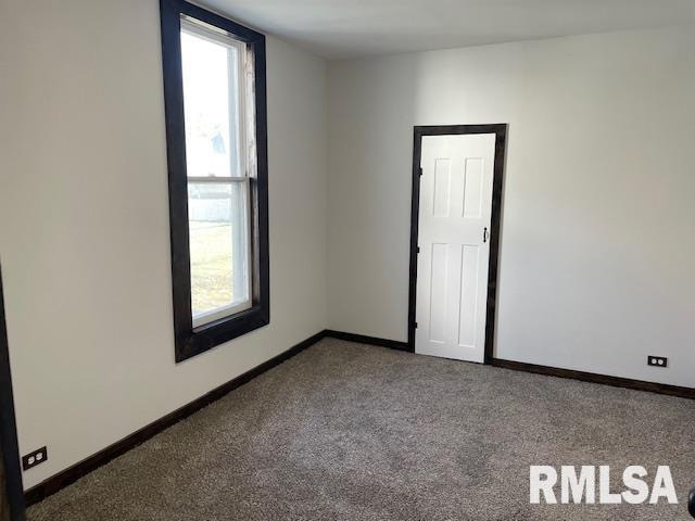 view of carpeted spare room