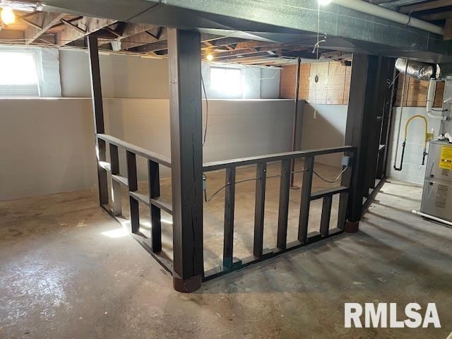 basement featuring plenty of natural light