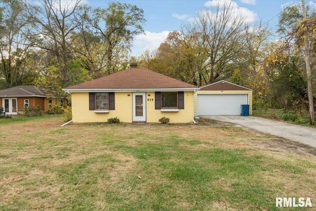 single story home with a front lawn and a garage