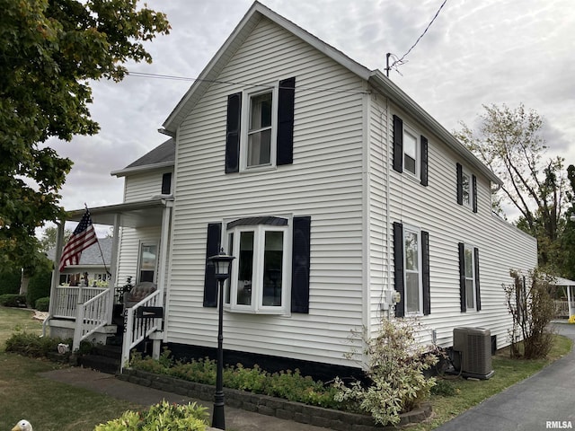 view of property exterior featuring central AC