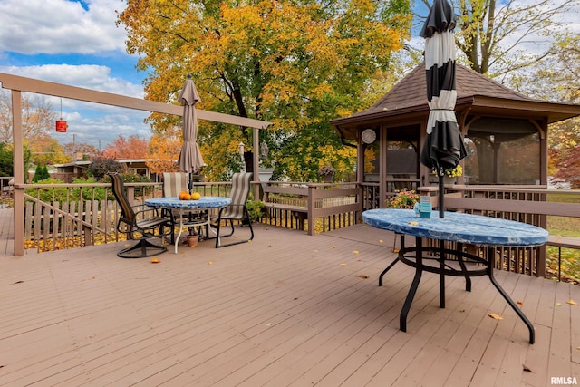 deck featuring a sunroom