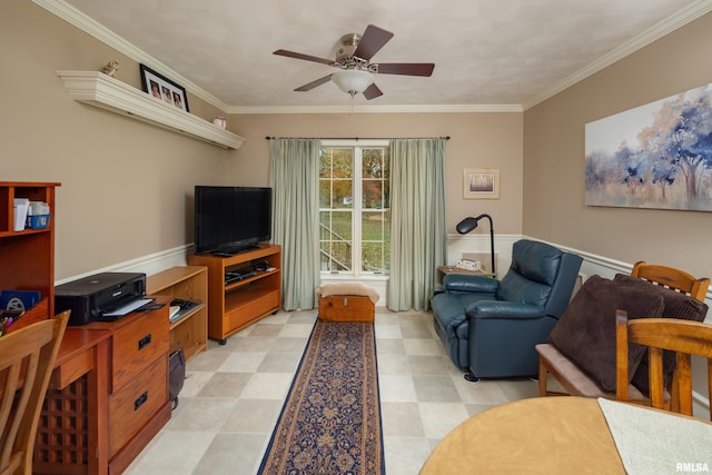 living room featuring ceiling fan and ornamental molding