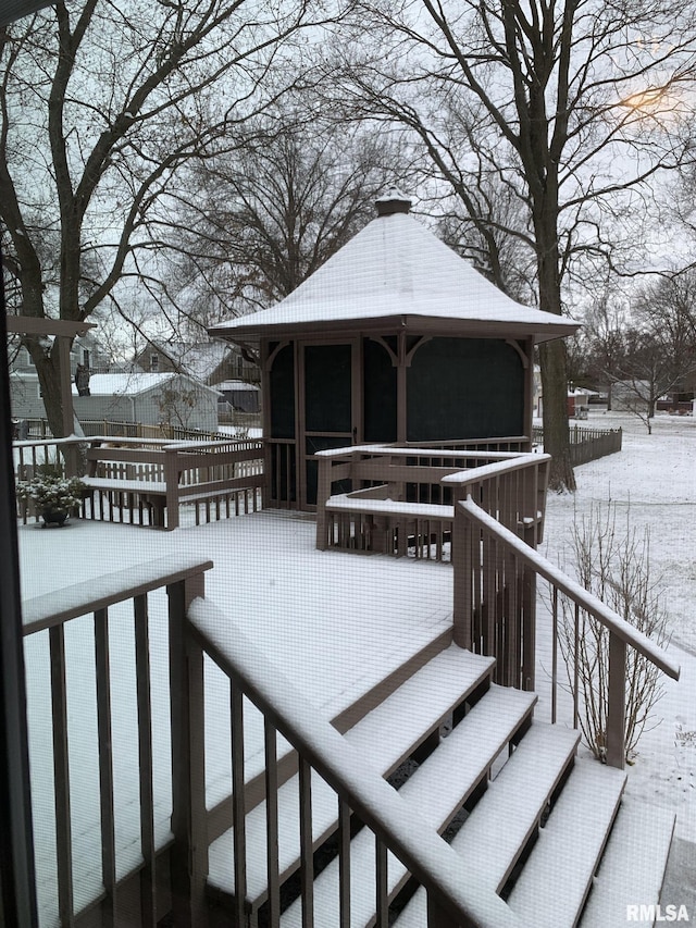 view of snow covered deck