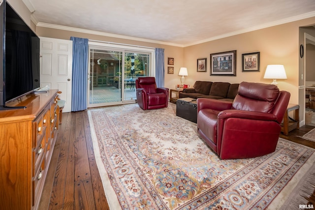 living room featuring dark hardwood / wood-style flooring and ornamental molding