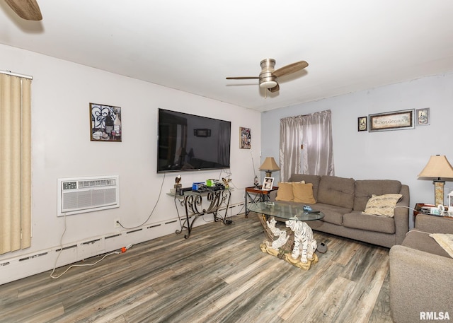 living room featuring a wall mounted air conditioner, wood-type flooring, and ceiling fan