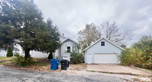 view of front of house featuring an outbuilding and a garage