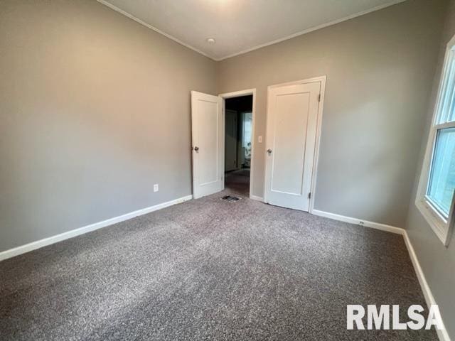 unfurnished bedroom with carpet