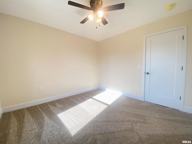 unfurnished room with carpet floors and ceiling fan