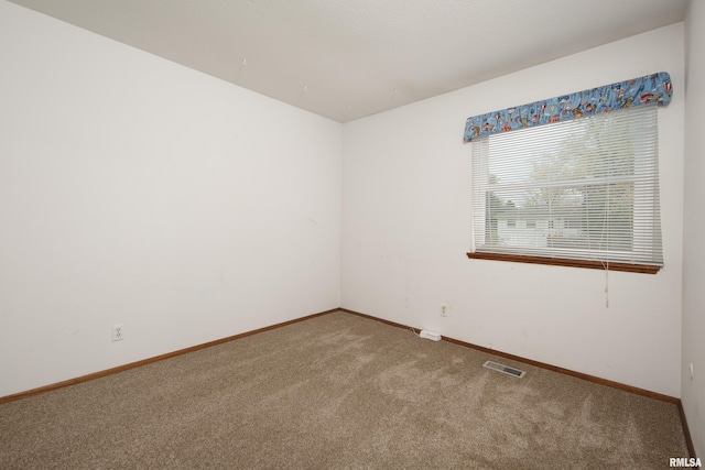 view of carpeted spare room