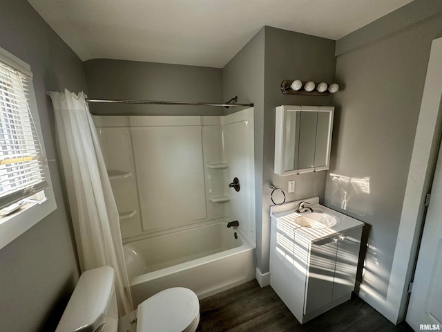 full bathroom with toilet, shower / tub combo, vanity, and hardwood / wood-style flooring