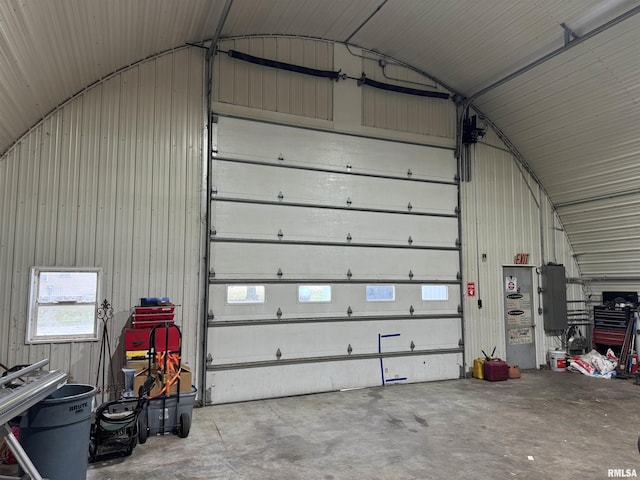 garage featuring a carport