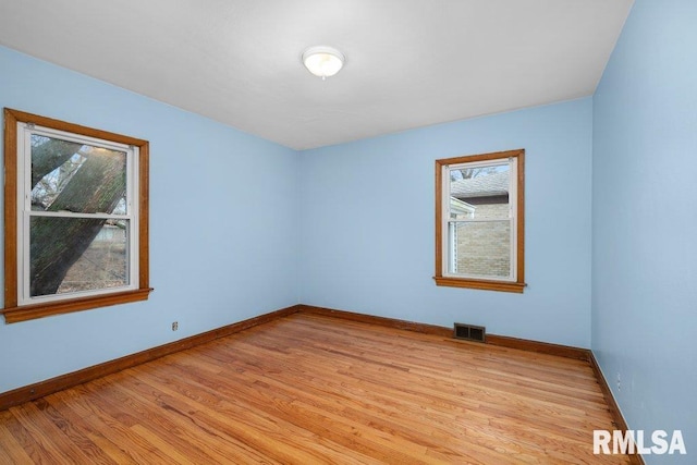 empty room featuring light hardwood / wood-style floors