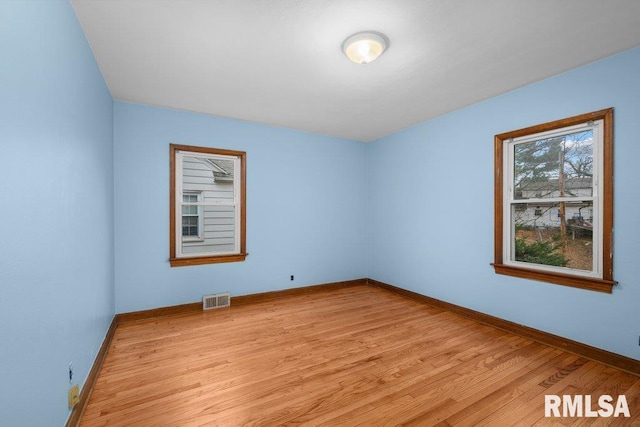 empty room featuring light wood-type flooring