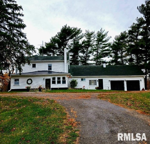 view of front of home with a front yard