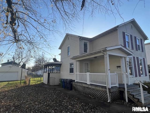443 4th Ave N, Clinton, IA 52732 - view of property exterior with a porch