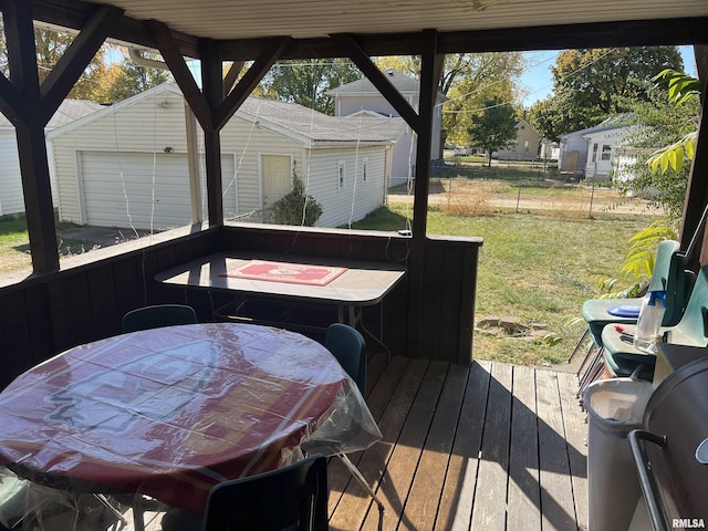 443 4th Ave N, Clinton, IA 52732 - deck featuring an outdoor structure and outdoor dining space