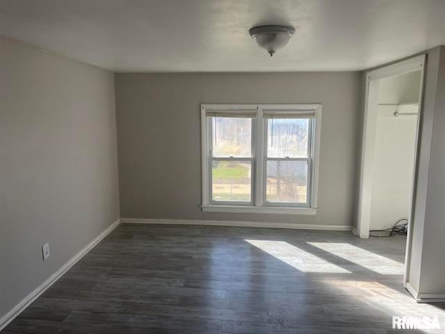 interior space with dark wood-type flooring