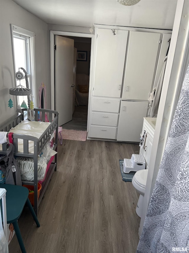 443 4th Ave N, Clinton, IA 52732 - interior space featuring dark wood finished floors