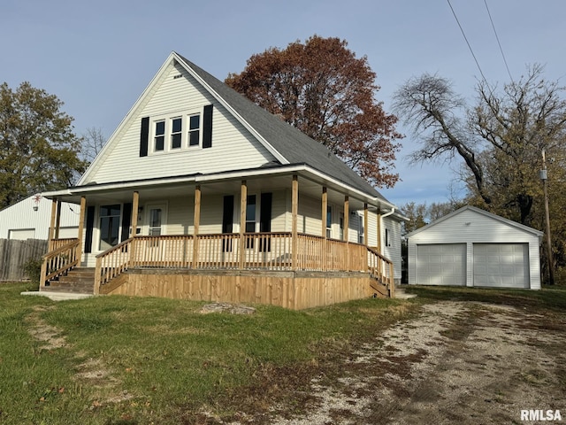 farmhouse-style home with a garage, an outdoor structure, a front lawn, and a porch