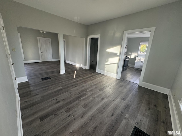 interior space with dark wood-type flooring