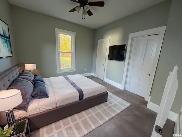 bedroom featuring carpet floors and baseboards