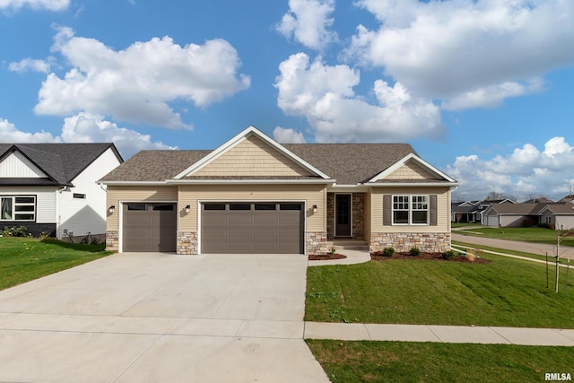 craftsman-style home with a front lawn and a garage