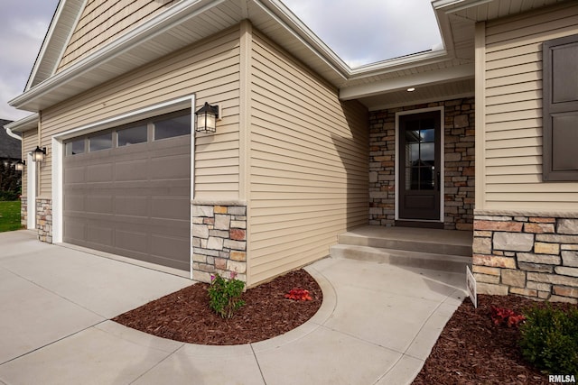 property entrance with a garage