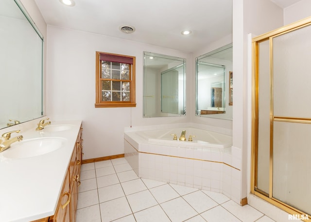 bathroom with vanity, tile patterned floors, and separate shower and tub